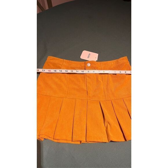 ELODIE PLEATED HEM MINI SKIRT YELLOW (MUSTARD) SIZE L NEW WITH TAGS - Picture 5 of 10